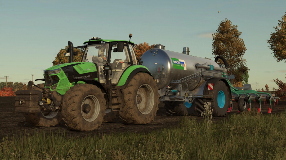 Farming Simulator 25 mods - Duport PTW 12500 v1.0.0.0 liquid manure tanker attached to a green tractor in a farm field.