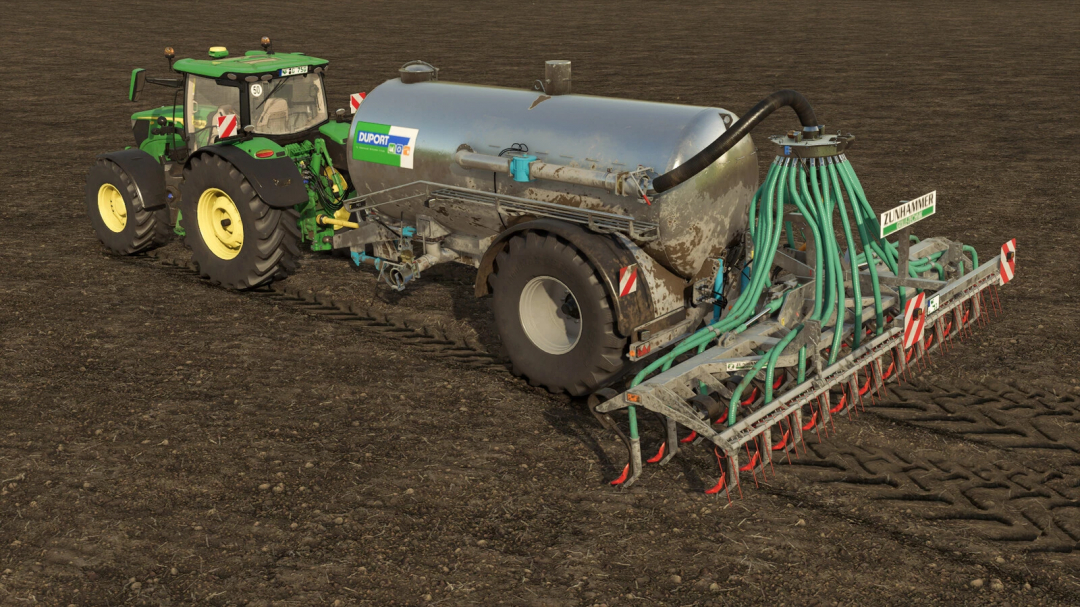 Farming Simulator 25 mod: Green tractor with a large slurry tank and slurry spreader for farming tasks.