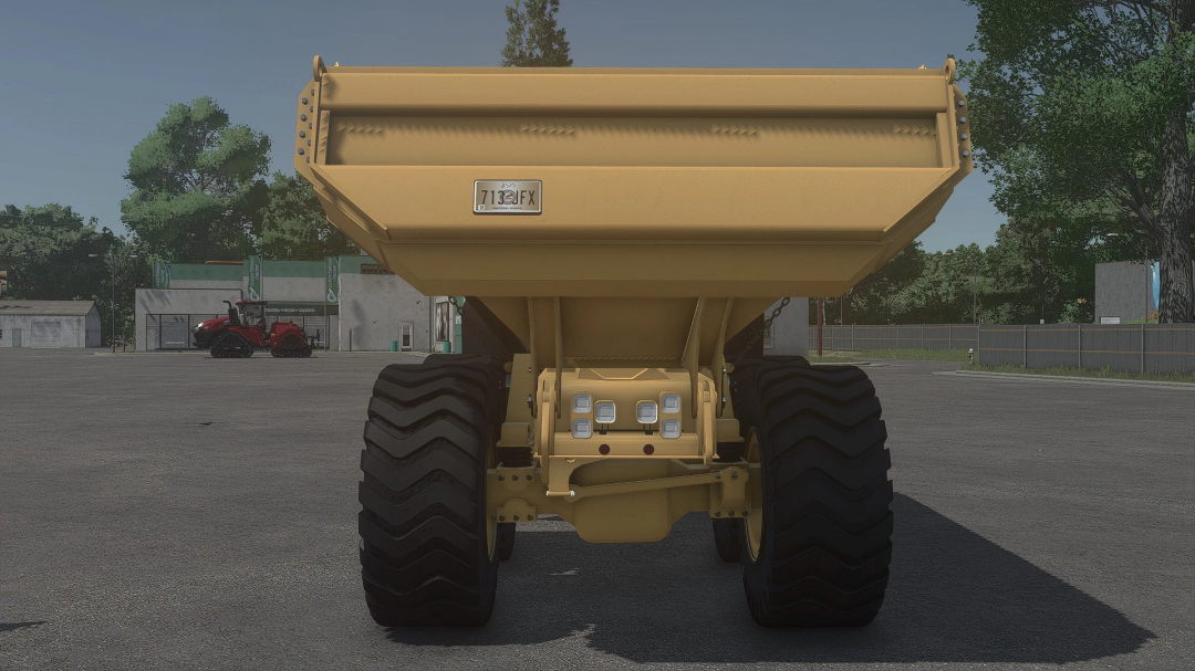 Farming Simulator 25 mod: FS25 Caterpillar 725A Dumper in a virtual yard, showcasing detailed textures and large off-road tires.