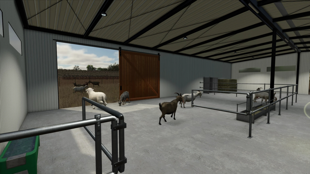 Indoor view of FS25 Modern Metal Sheep Barn with goats and sheep, part of FS25 mods, in Farming Simulator 25.