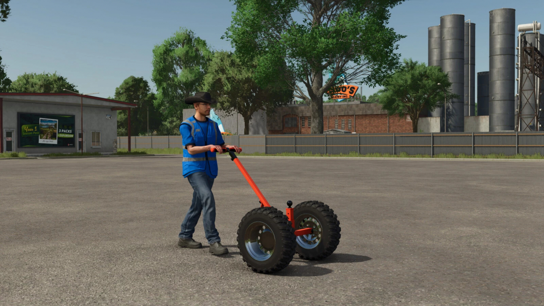 Farmer using a Farmyard Trailer Dolly mod in Farming Simulator 25 on a concrete lot with industrial background.