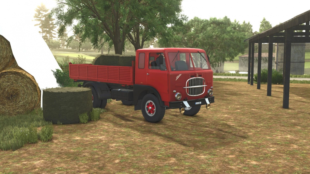 Farming Simulator 25 mod: Classic red Fiat 682 N4 truck with loaded hay bales on a farm.
