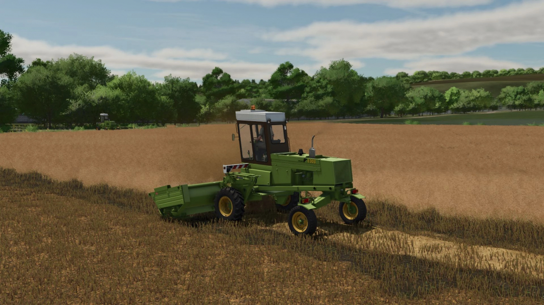 Farming Simulator 25 mod featuring the Fortschritt E 303 Pack v1.0.0.0 on a farm field with a tractor attachment for crop harvesting.