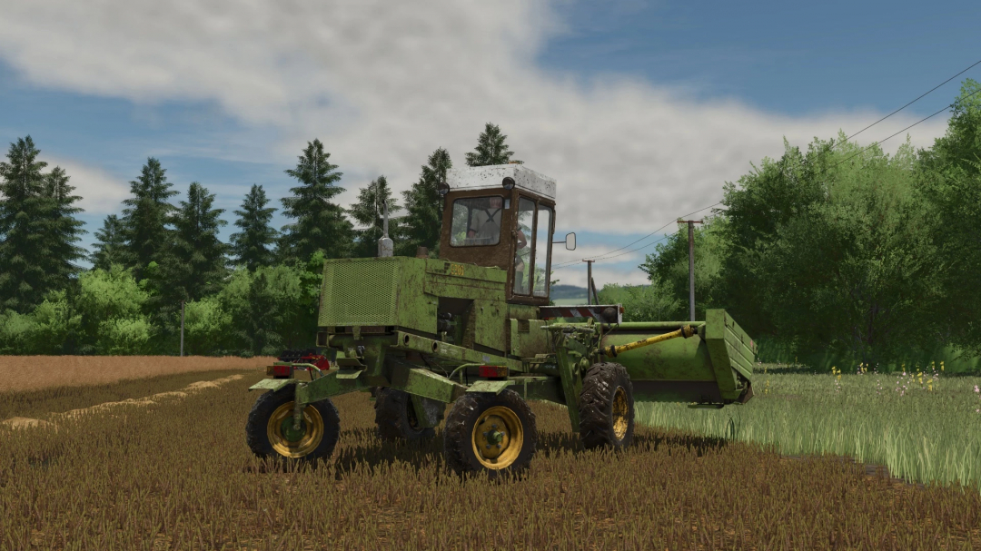 Farming Simulator 25 mod featuring Fortschritt E 303 vintage tractor in a field with green trees and a blue sky.