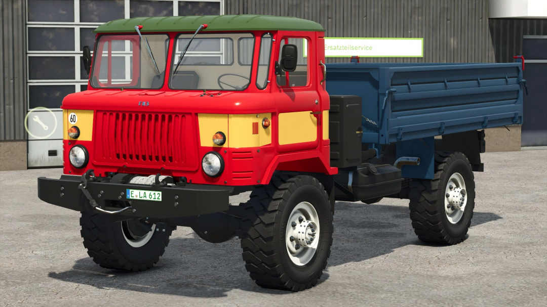 FS25 mod GAZ 66 v1.0.0.0, rugged off-road truck with red cab and blue cargo bed, in Farming Simulator 25.