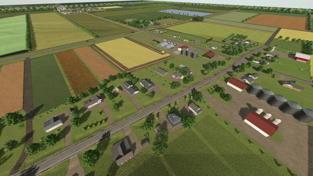 A detailed aerial view of Gnadenthal Map v1.2.0.0 in Farming Simulator 25, showcasing farmland, houses, silos, and roads with lush greenery.