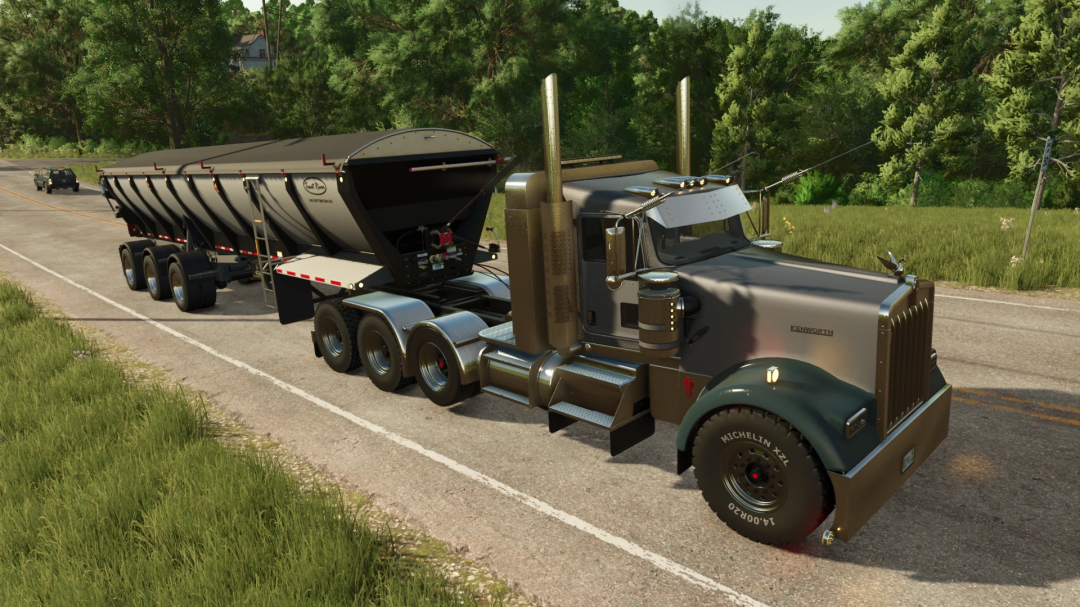 Kenworth W900L truck with a large trailer mod in Farming Simulator 25, realistic road and lush green surroundings.