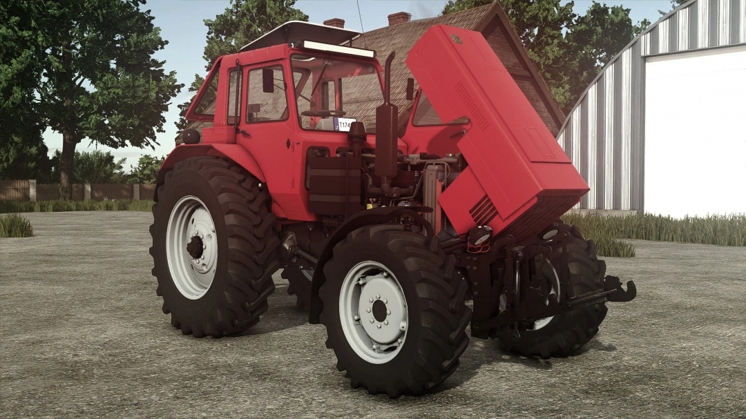 Red farming tractor with open hood, large tires, and cabin, from FS25 mods in Farming Simulator 25.