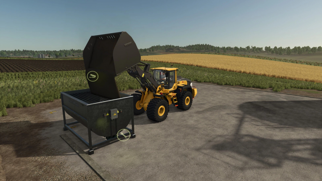 Farming Simulator 25 mod: Loader tractor filling mineral feed production machine with a black feeder attachment on a farm road.