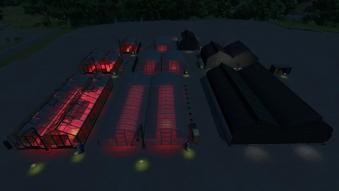 Night view of a farming collection with greenhouses, storage sheds, and farm buildings in Farming Simulator 25 using Multi Crop Greenhouses mod.