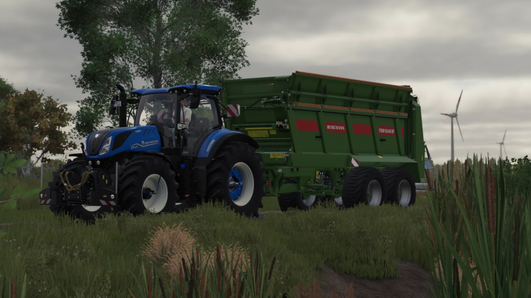 Farming Simulator 25 mod featuring a blue New Holland T7 tractor with a green Bergmann TSW 6240 W forage wagon in a rural setting.