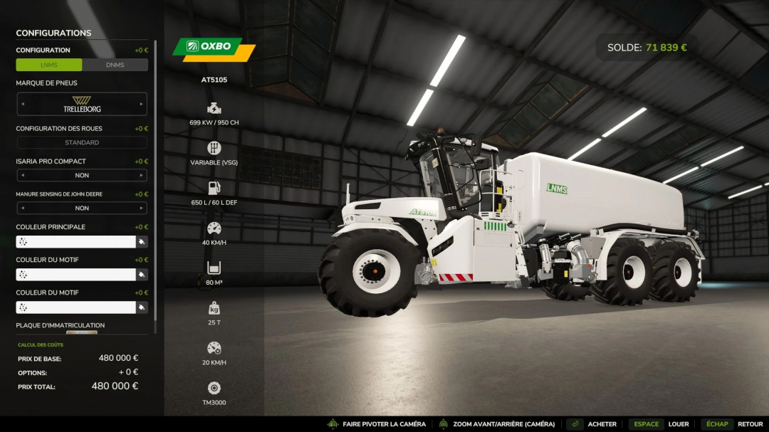 Farming Simulator 25 mod image of the OXBO AT5105, a white fertilizer spreader with green and yellow details inside a large industrial warehouse.