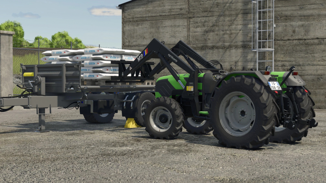 Farming Simulator 25 mod: Green tractor with vineyard equipment and bags of fertilizer, part of the SDF Vineyard Pack v1.0.0.0.