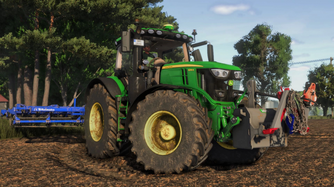 Farming Simulator 25 mod featuring a John Deere 6230R tractor with a blue Rolmako implement on a farm field.