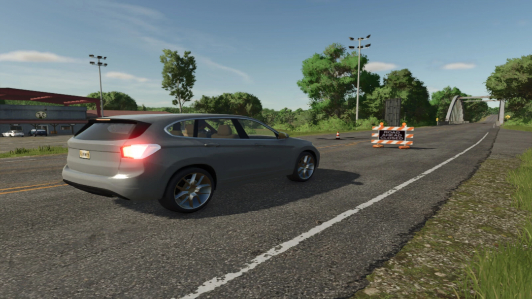Farming Simulator 25 mod image showing a car approaching a closed road with a traffic cone and barricade, part of the Traffic Cones And Barricades v1.0.0.0 mod.