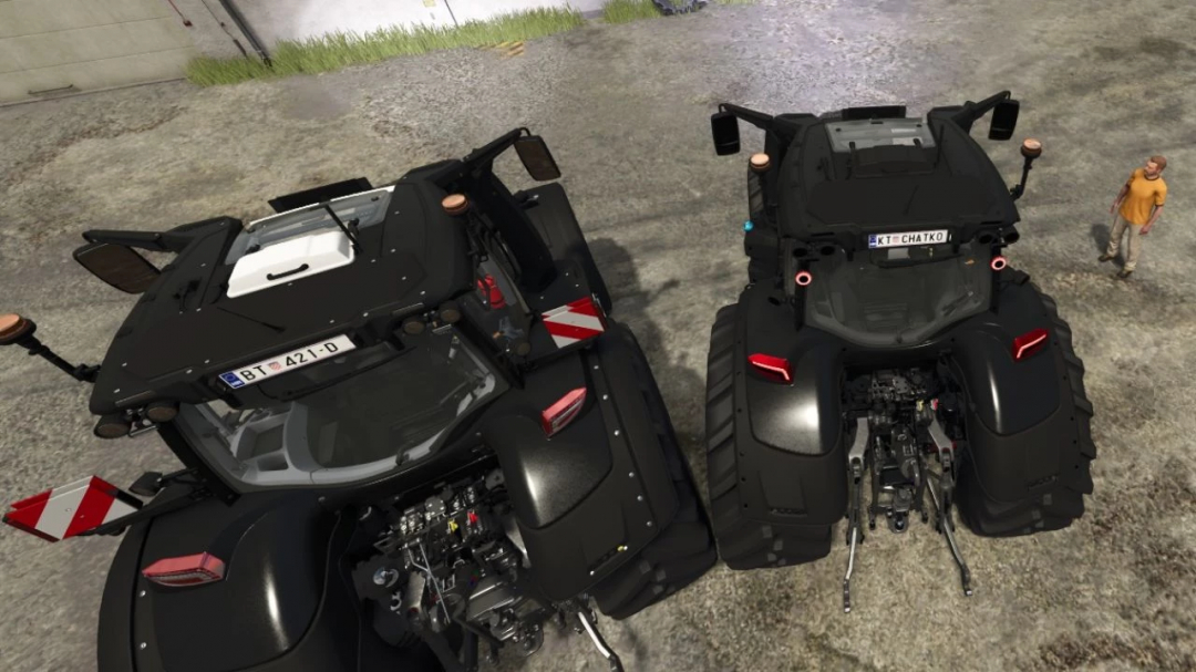 Two Valtra S BlackedOut v1.0.0.0 models from Farming Simulator 25 mods, shown from above in a farm setting.