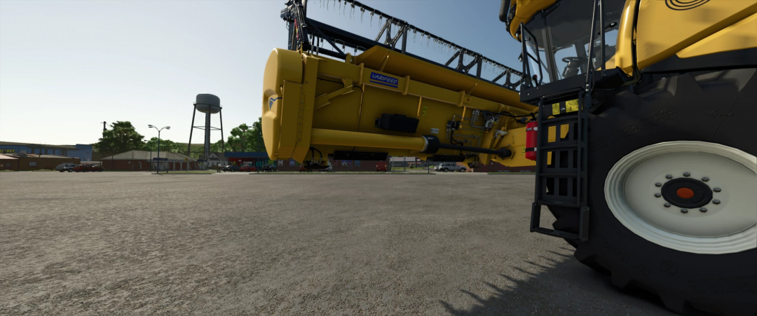 Farming Simulator 25 mod: Varifeed 28ft as Claas & New Holland v6.0.0.0 in a farmyard setting.