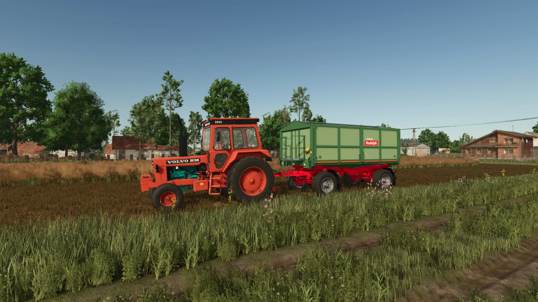Farming Simulator 25 mod featuring a vintage Volvo BM 2650 tractor towing a green trailer in a rural field.