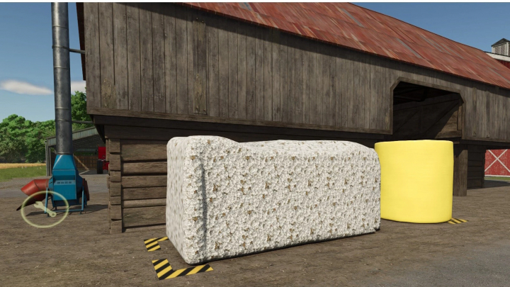 fs25-mods, FS25 mod: Grass Dryer and Storage units, including a white and a yellow bale, outside a barn in Farming Simulator 25.