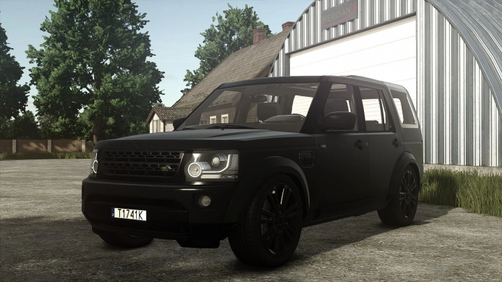 fs25-mods,  In-game screenshot of a black Land Rover Discovery 4 mod in Farming Simulator 25, parked outside a metal shed with trees in the background.