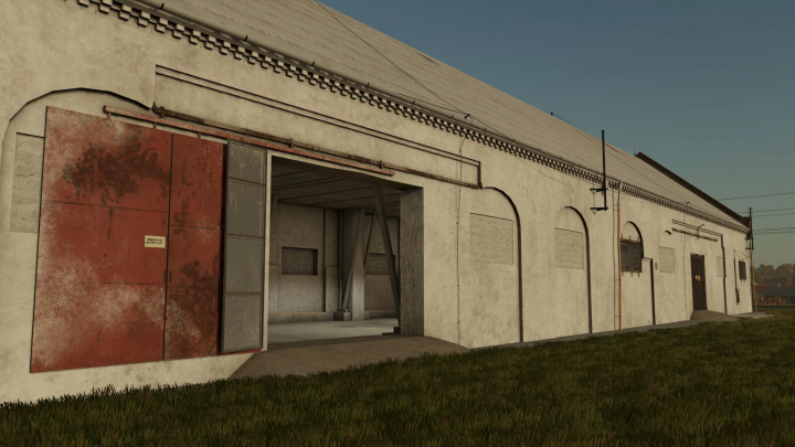 fs25-mods, Old grain storage building in Farming Simulator 25 with rusted red doors, part of the Old Grain Storages Pack mod.