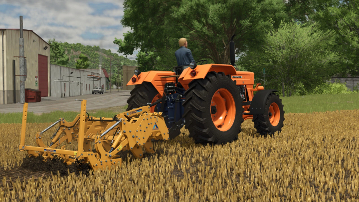 fs25-mods,  Farming Simulator 25 mod: Orange tractor with cultivator attachment working in a wheat field, with farm buildings and trees in the background.
