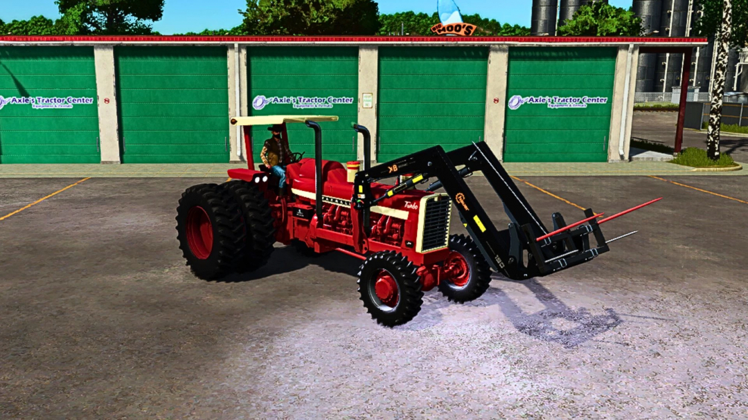 Farming Simulator 25 mod: Red tractor with front loader attachment and operator, parked in front of green storage units at Axle's Tractor Center.