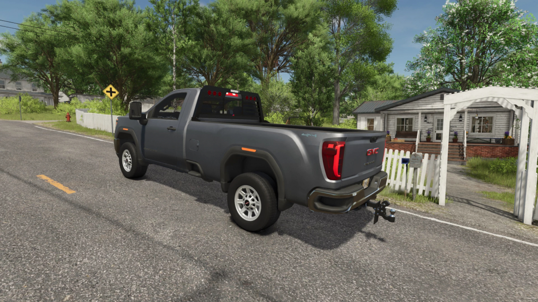 GMC Sierra 3500HD truck parked on the street in Farming Simulator 25, showcasing FS25 mods with a realistic design.