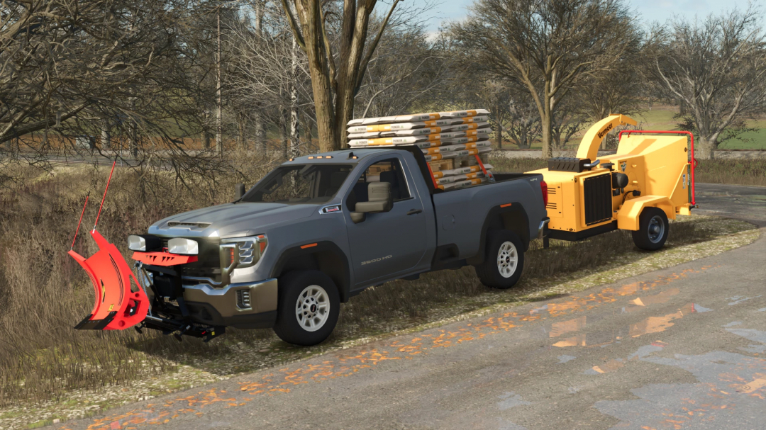 Farming Simulator 25 mod: Gray GMC Sierra 3500HD truck with yellow wood chipper attachment for forestry tasks.
