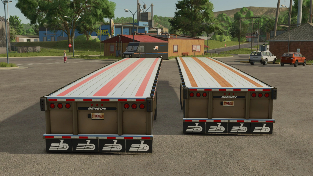 Two FS25 Benson Flatbed trailers parked in a lot in Farming Simulator 25, showcasing mods for Farming Simulator 25.