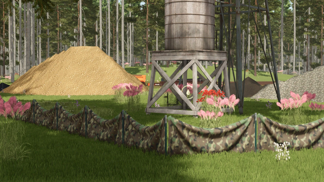 Farming Simulator 25 mod: construction fences with camouflage pattern, water tower, piles of sand and gravel, surrounded by pink and white flowers in a forest setting.