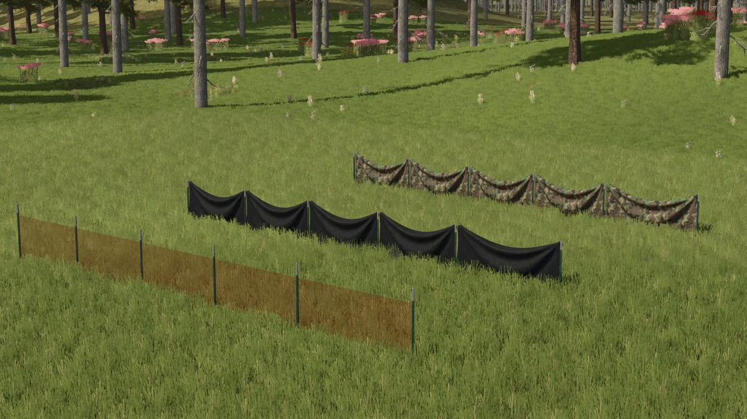 Farming Simulator 25 mod: construction fences in a grassy field, including black and camouflage fencing, showcasing FS25 construction fence mods.