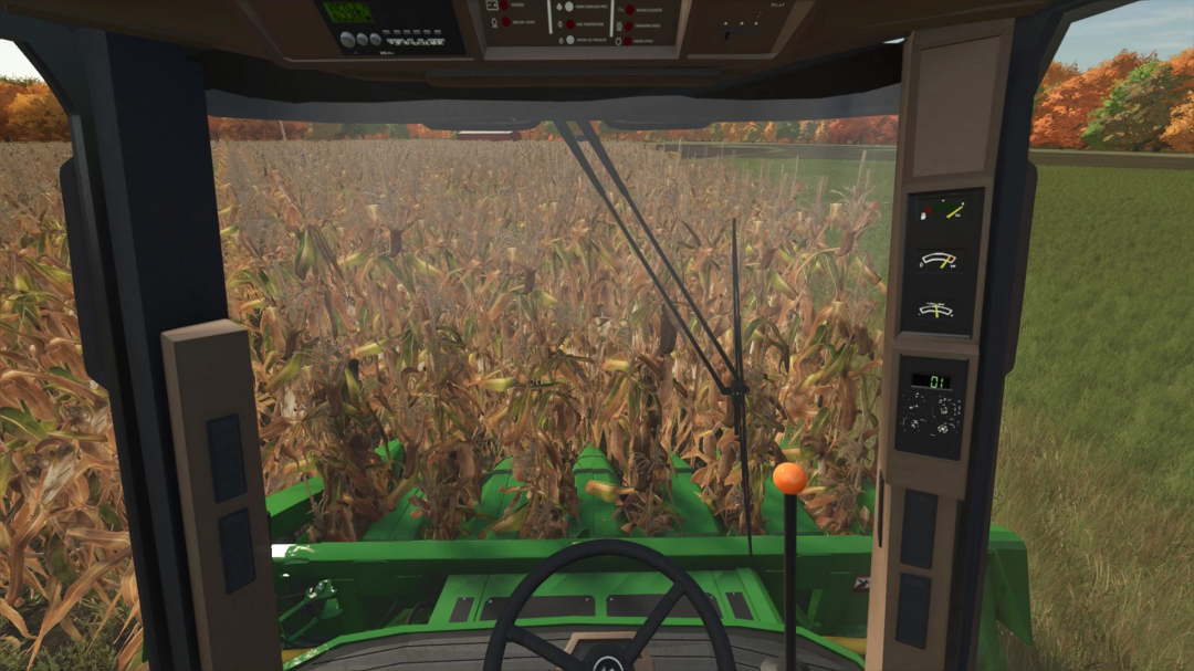 Farming Simulator 25 mod: Interior view of a tractor with crop fields visible through the windshield, showcasing FS25 mods.