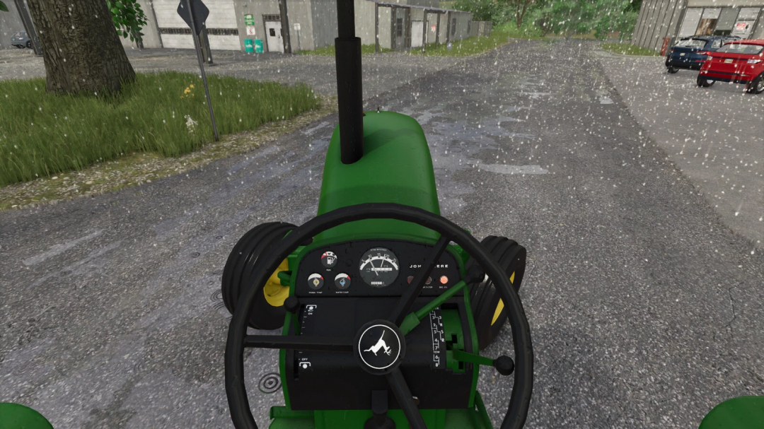 Inside view of a green John Deere tractor in Farming Simulator 25, showing the dashboard with gauges during rain on a parking lot.