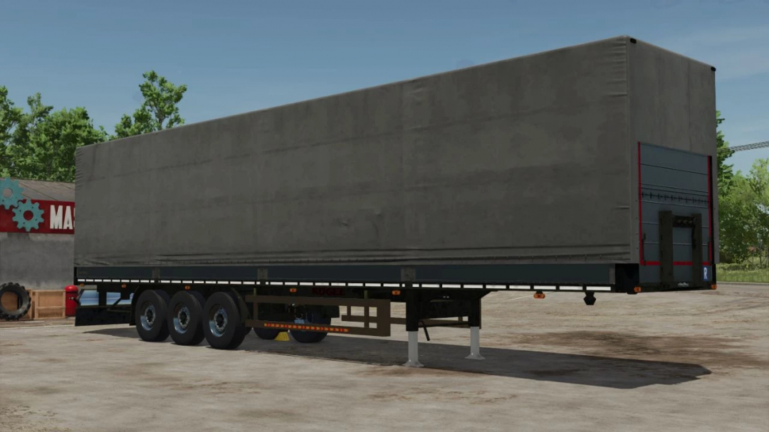 KÖGEL Trailer pack 3 v1.0.0.0 from Farming Simulator 25 mods, featuring a large gray trailer with a reinforced rear door, in a game environment.