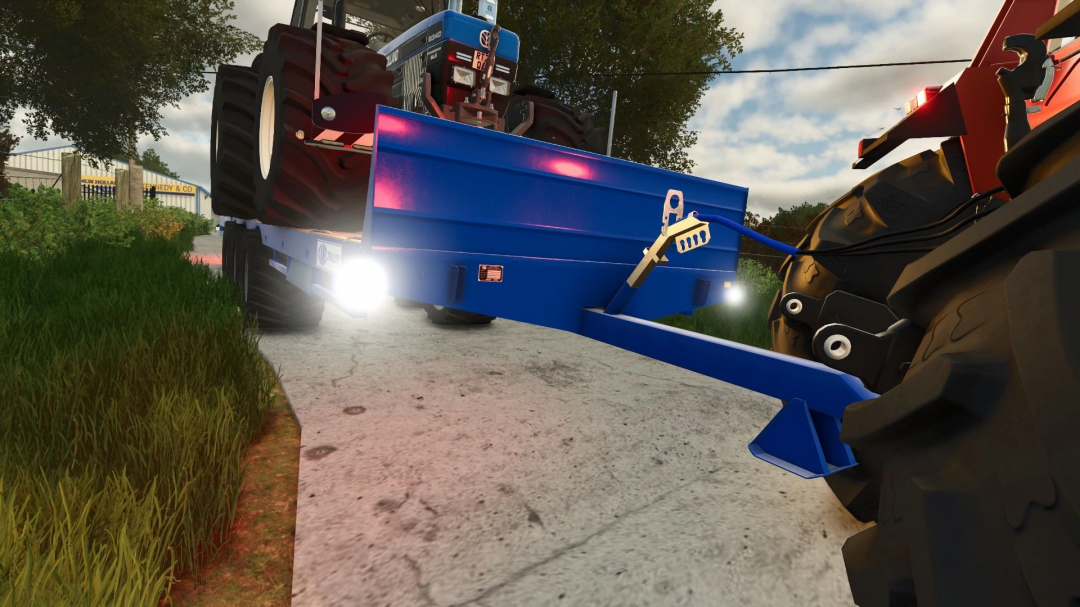 Farming Simulator 25 mods: Blue Kane LBT 24T trailer attached to a tractor, ready for farming tasks in FS25.