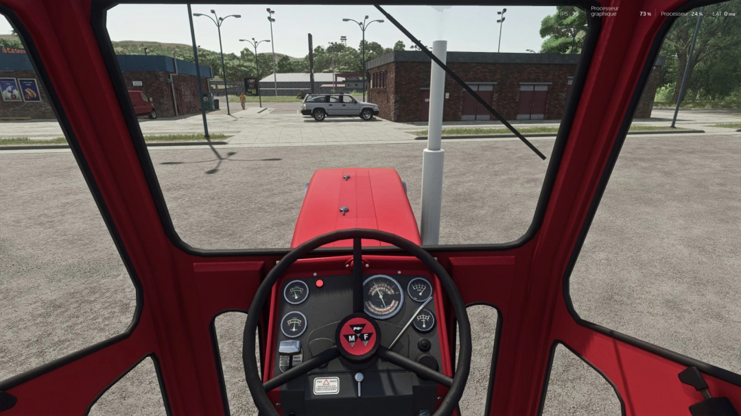 Inside view of a red Massey Ferguson tractor in Farming Simulator 25, showing the dashboard and steering wheel.