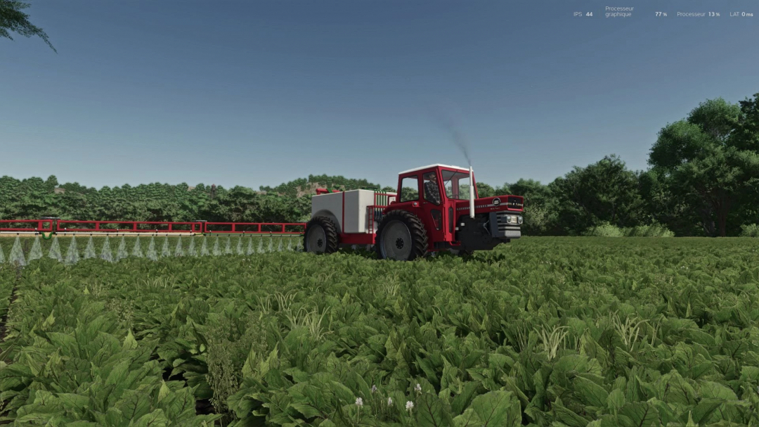 Farming Simulator 25 mod: Massey Ferguson 185 tractor spraying crops in a field.