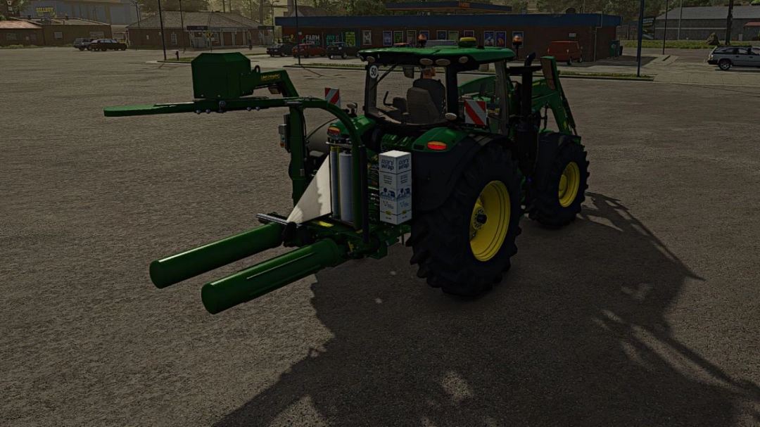 Farming Simulator 25 mod: John Deere tractor fitted with McHale 991 baler attachment, realistic agricultural equipment.
