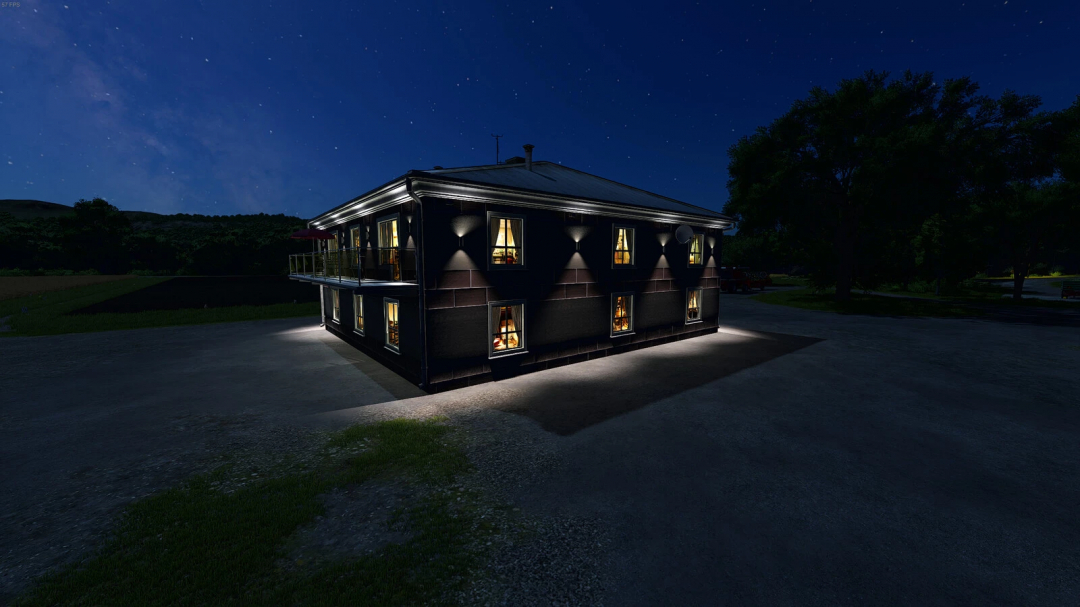 Night view of a modern Polish house mod in Farming Simulator 25, illuminated windows, outdoor lighting, and a starry sky.