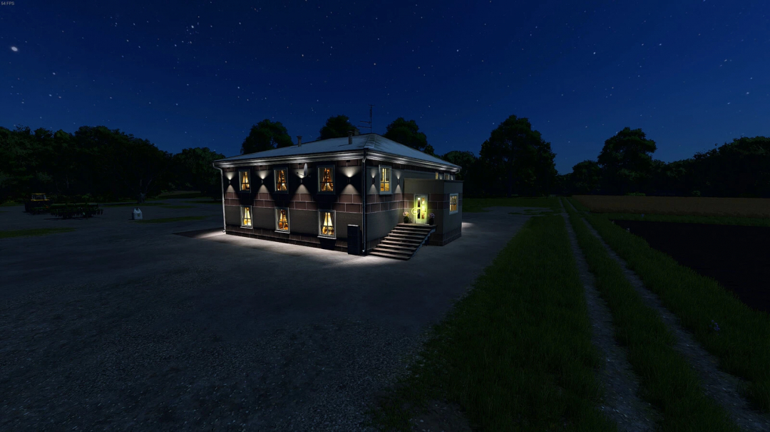 Night view of a modern Polish house mod in Farming Simulator 25, illuminated windows and exterior lighting, surrounded by fields and trees.