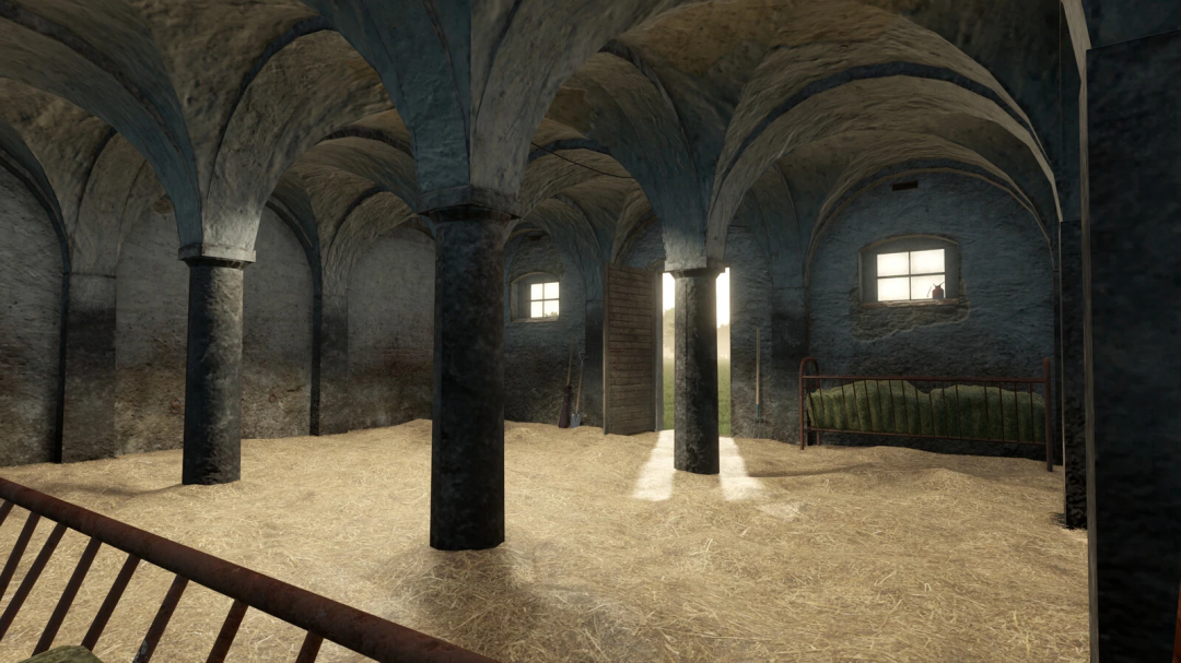 Interior of the Old German Barn mod in Farming Simulator 25, with stone walls, hay floor, and small windows, part of FS25 mods.