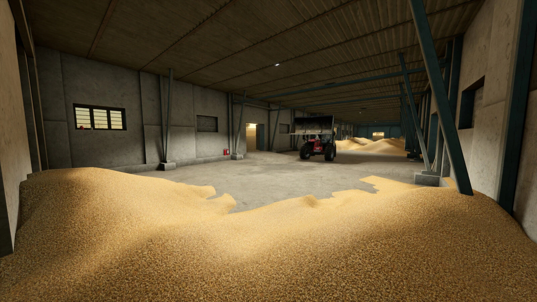 Inside a grain storage warehouse in Farming Simulator 25 with large grain piles and a tractor, part of the Old Grain Storages Pack mod.