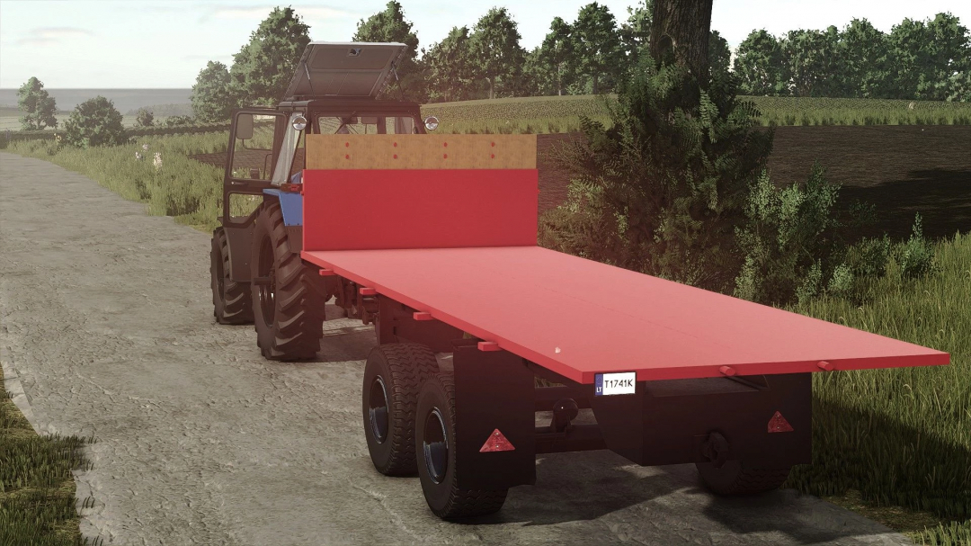 Farming Simulator 25 mod: PTS 9 Platform v1.0.0.0 attached to a tractor on a rural dirt road.