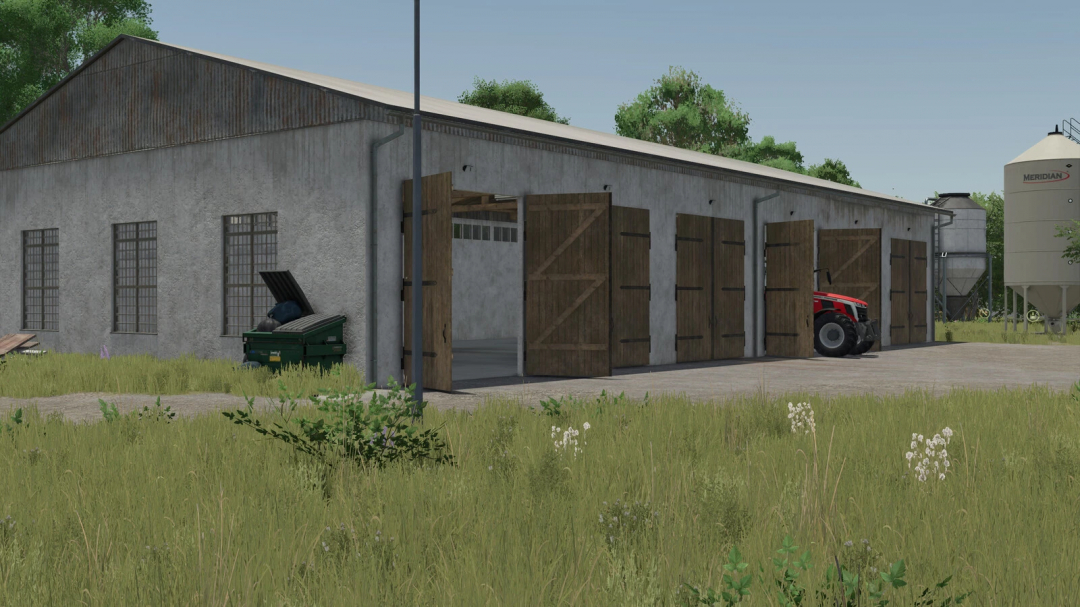 Farming Simulator 25 mod: Pig Farm Building Package v1.0.0.0, featuring a barn with open doors, tractor, and outdoor storage.