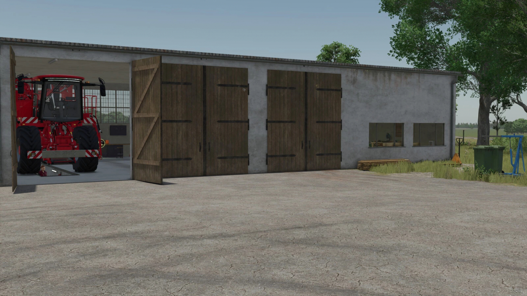 Farming Simulator 25 mod: Pig Farm Building Package v1.0.0.0, featuring a large pig barn and farm equipment inside.