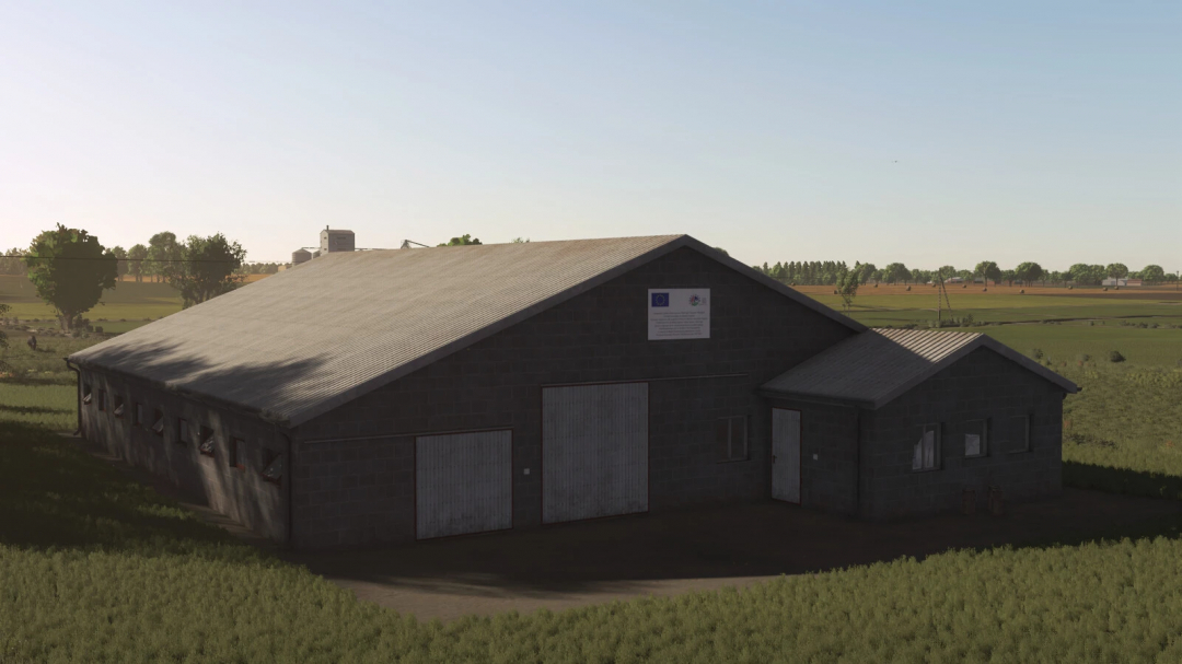 In Farming Simulator 25, a rustic barn with a tiled roof in a rural landscape, representing a mod for agriculture.
