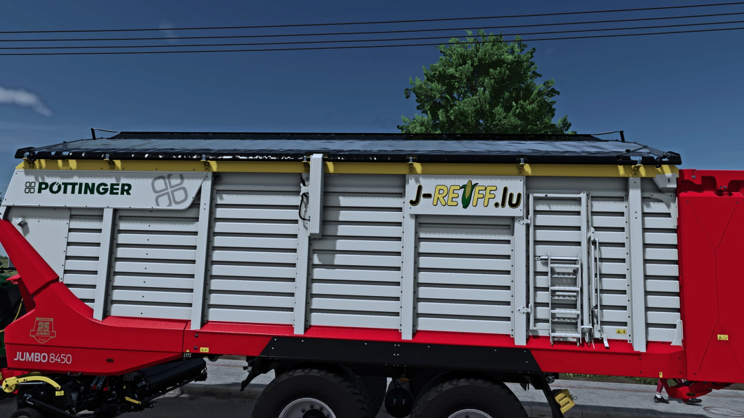 Farming Simulator 25 mod: Pöttinger Jumbo 8450 DB+ forage wagon for FS25, shown outdoors on a bright day.