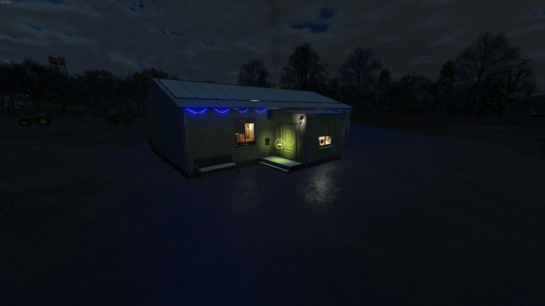 Night view of the Single Family Farmhouse mod in Farming Simulator 25, featuring exterior lighting and snow-covered ground.