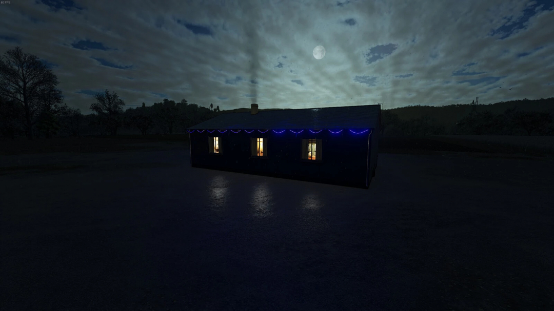 Nighttime scene from Farming Simulator 25 showing a small house illuminated from within under a moonlit sky, showcasing the Single Family Farmhouse v1.0.0.0 mod.